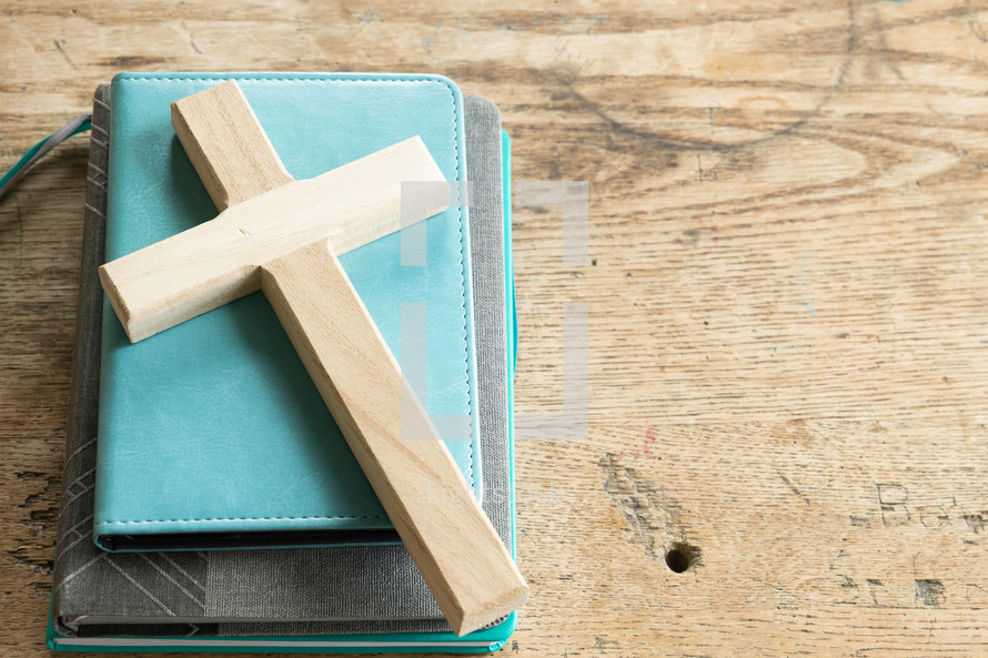 cross on a teal Bible 