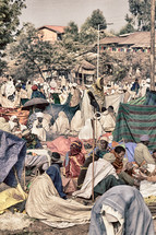 crowds of people in tents gathered for a celebration in Ethiopia 