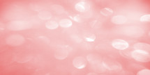 soft coral pink color bokeh background ready for your text, graphics or photos