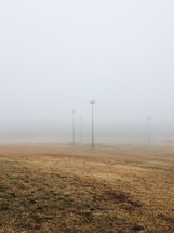 fog over a sports field 
