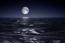 full moon over the ocean 
