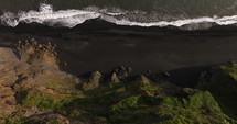 Black sand beach Iceland aerial top down view