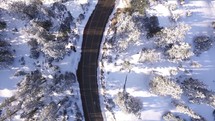 aerial view above snow and road 