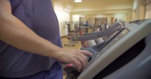 Man finishing his workout on treadmill