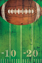 American football on a wooden sign 