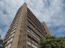 LONDON, ENGLAND, UK - JUNE 20, 2011: The Balfron Tower designed by Erno Goldfinger in 1963 is a Grade II listed masterpiece of new brutalist architecture