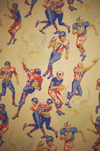 a wall with vintage sports wallpaper