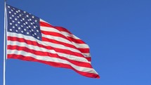 American flag blowing in the wind. Clip has 2 color treatments.