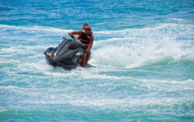 A man riding a jet ski