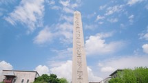 Turkey Istanbul, May 2023: Obelisk of Theodosius (Dikilitas) with hieroglyphs in Sultanahmet Square, Istanbul, Turkey. Ancient Egyptian obelisk in Istanbul City
