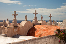 stone crosses on a rooftop in Korsika 