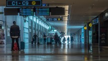 TEL AVIV, ISRAEL- Timelapse shot of people traffic in the hall with gate pointers and travelator. Inside Ben Gurion International Airport