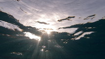 Underwater looking up to the sunlight