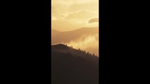 Mysterious mountains nature at golden sunrise Vertical video
