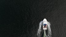 A small boat sailing in the ocean