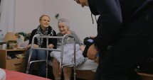 Family visiting grandmother in the hospital