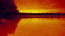 orange glow at sunset over Lake Hartheim 
