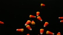 slow motion candy corn spilling 