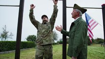 General Checks Physical Fitness Of Marines With Pull-ups For Navy Seals Test