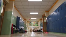 school hallway with lockers 