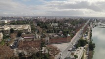 San Telmo Palace and cityscape, Seville in Spain. Aerial circling