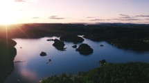 aerial view over a lake at sunset 