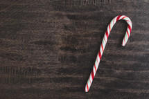 candy cane on a wood background 