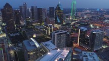 Aerial Of Skyscrapers In Downtown Dallas Texas At Night city drone shot 4k	