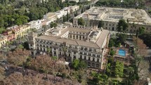 Drone pan around 5-star Hotel Alfonso XIII, luxury hotel in Seville, Spain
