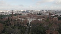 Aerial parallax of Plaza de Espana, flight over Maria Luisa Park, Seville