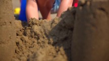 building sand castles on a beach 