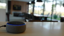 Mazon Echo Smart Home Device, Alexa Answers Question.
