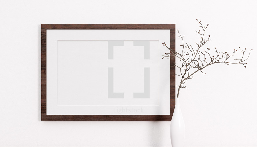 Product placement concept. Mockup or copy space for media presentation. Wooden landscape frame on white background