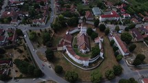 Aerial overview of the medieval fortified church of Harman in Transylvania