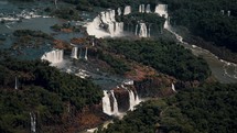Aerial View Of Iguacu Falls And Lush Forest In Argentina And Brazil.