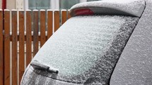 Motion Timelapse Of A Car Rear Window Frosting And Defrosting During Winter. close up