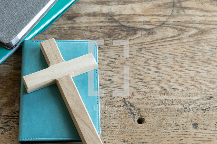 cross on a teal Bible 