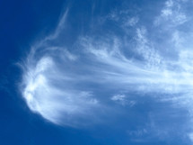 blue sky and white clouds with streaks 