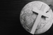 cross and globe in black and white 
