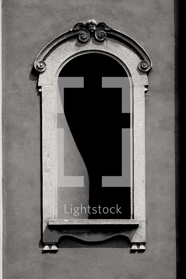 A window on a historical building in Italy