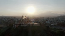 Church Of Our Lady Of Remedies At The Top Of Cholula Pyramid In Puebla, Mexico At Sunrise - aerial drone shot