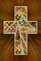 Mosaic cross on gold and orange rays
