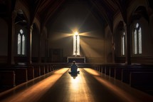 a person kneeling in prayer in church