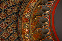 ornate red and gold ceiling detail