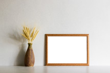 wheat grains and blank frame 