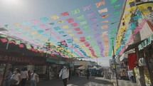 Traditional colorful waving flags in the streets of Oaxaca, Mexico	