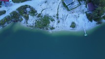 Aerial view from above on turquoise lake in an old quarry