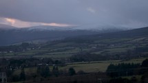 Pan of Sunset Over Snow Capped Mountains, North East Wicklow, Ireland
