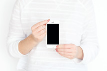 a woman holding a cellphone 