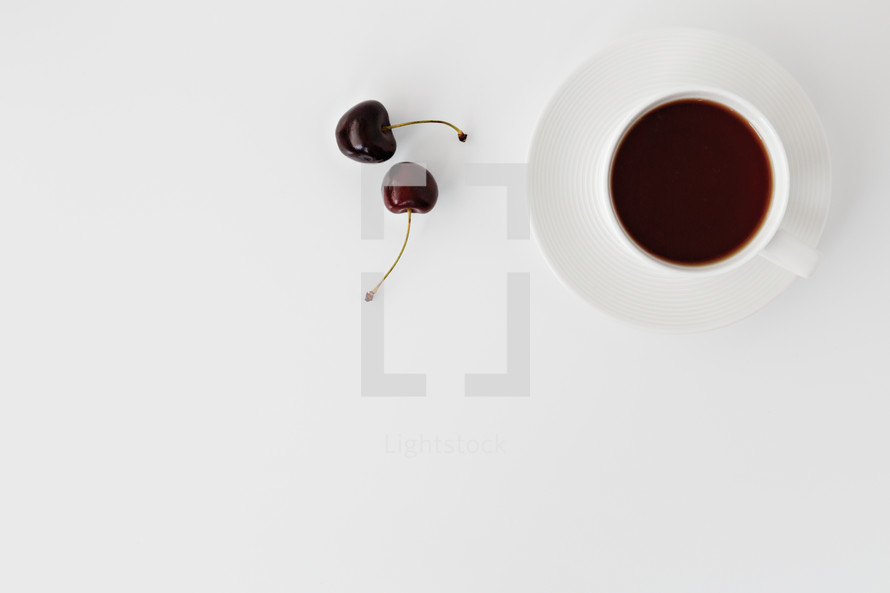 cherries and cup of coffee 
